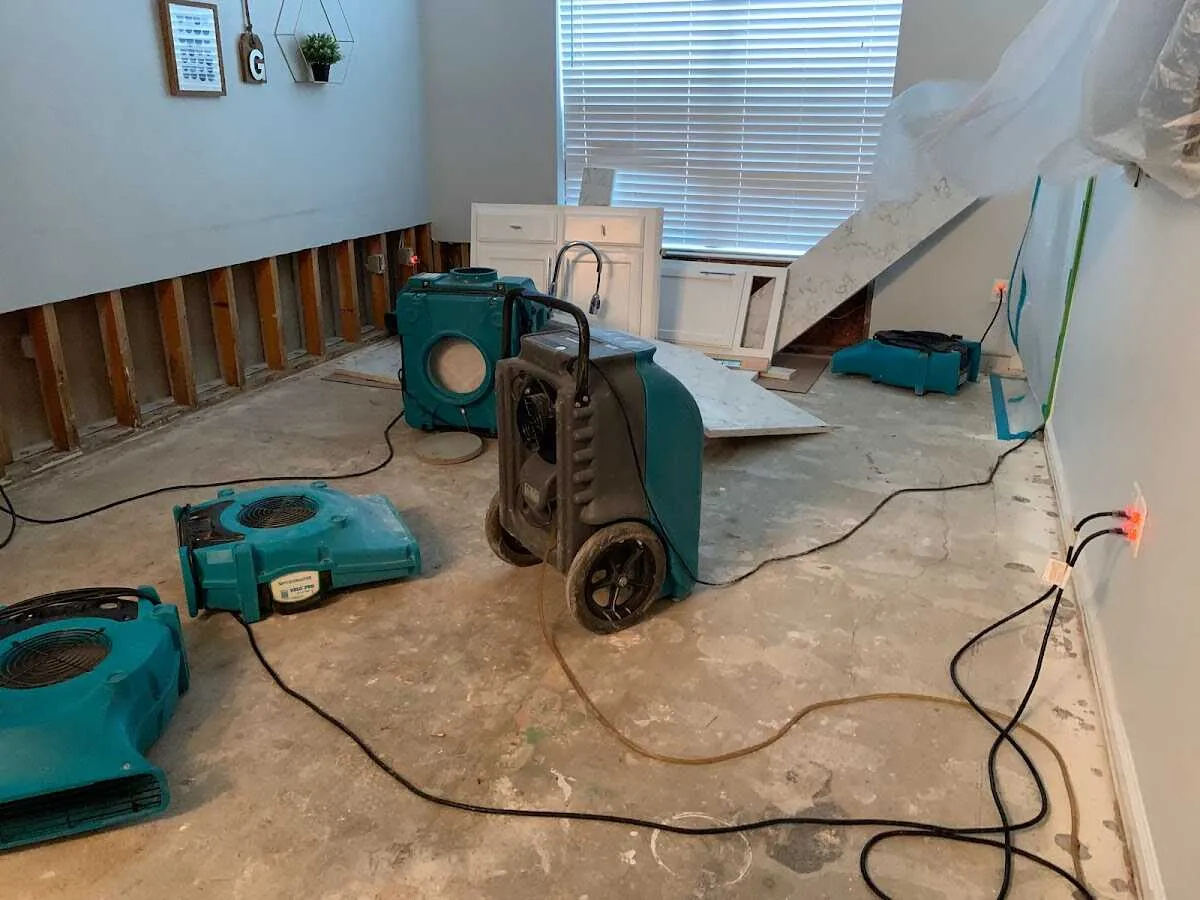 Dehumidifier in flood-cut room for Water Damage Restoration in Lemoore Station